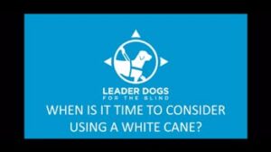 A blue background features the logo of Leader Dogs for the Blind along with the text, "WHEN IS IT TIME TO CONSIDER USING A WHITE CANE?"