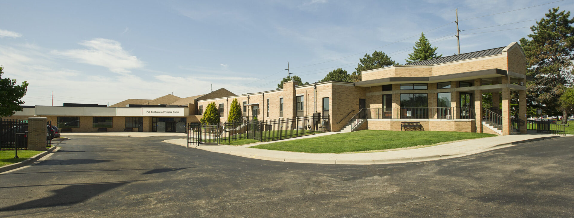 A wide image of the Leader Dogs for for the Blind admin and residence building.