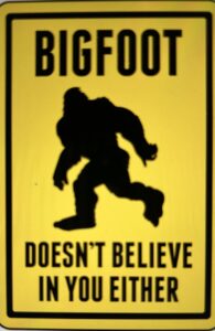 A sign depicting the image of Bigfoot with a caption that reads “Bigfoot doesn’t believe in you either.”