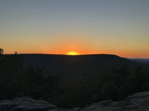 The sun is barely visible over Mt. Magazine, near Dardanelle, Arkansas. It’s near Yell County.